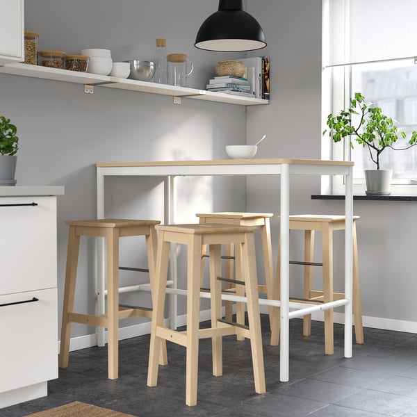 Modern NILSOLLE bar set with light wood, pendant light, and kitchen items.