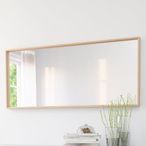 Mirror with wooden frame reflects bright room, adds elegance. Can hang vertically or horizontally.