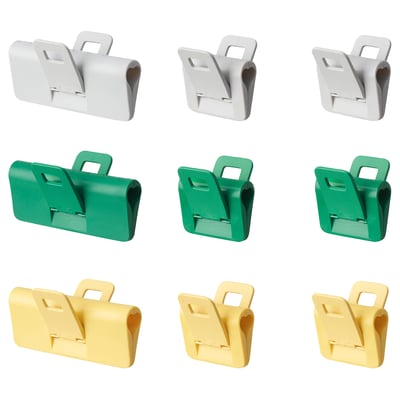 Nine sealing clips in gray, green, yellow. Foldable handles, seals bags.
