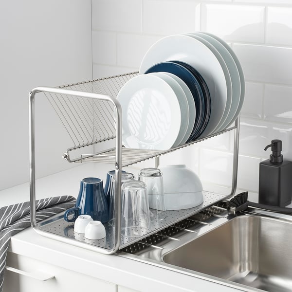 Stainless-steel dish drainer holds plates, bowls, and glasses, fitting up to 29 plates.