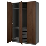PAX wardrobe in walnut, open doors reveal shelves and drawers. Modern, organized, gray and wooden design.