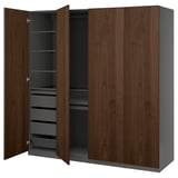PAX wardrobe in walnut and gray has doors open revealing drawers and shelves.