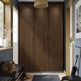 Wooden PAX wardrobe, tall with natural grain, offers ample storage.