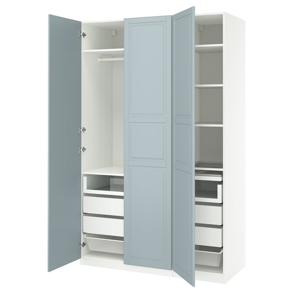 A PAX wardrobe in light blue with shelves and drawers.