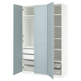 A light blue PAX wardrobe with open doors, revealing shelves and drawers inside.