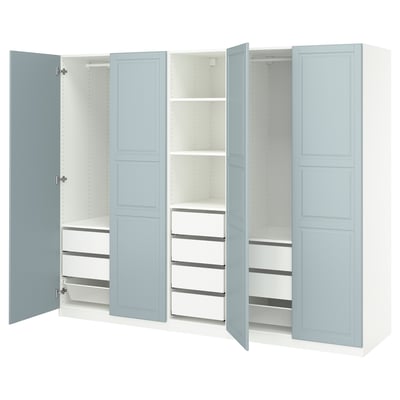 Light blue PAX wardrobe with shelves and drawers, open doors revealing interior.