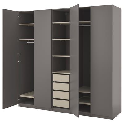A grey IKEA PAX wardrobe with open doors, displaying shelves and drawers.