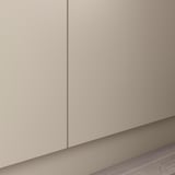 This image shows a section of a beige, modern wardrobe with minimalist design and light-colored interior.