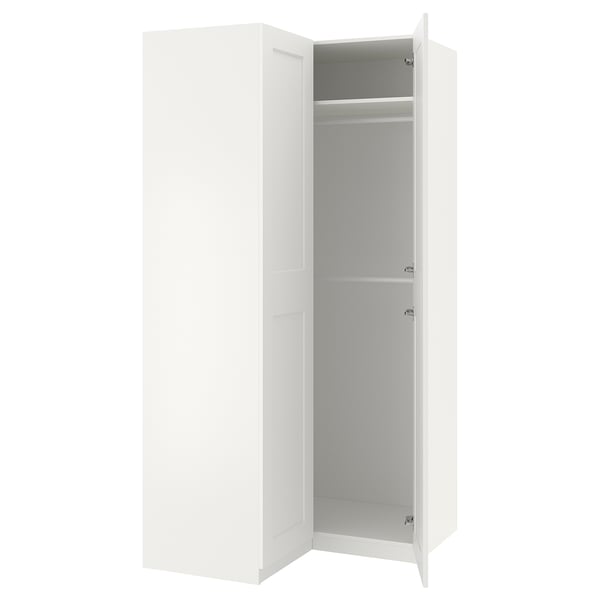 White PAX wardrobe with open door, minimalist design, simple storage solution.
