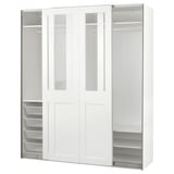 White PAX wardrobe with glass doors, mesh drawers, and metal frame.