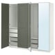Option: An open green PAX wardrobe with shelves and drawers. It a mirror door and soft-close hinges, offering storage solutions for clothes and accessories.