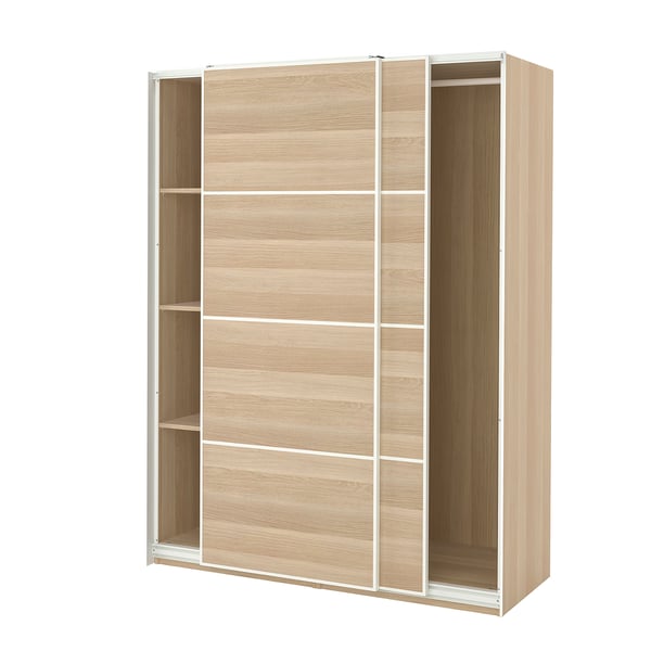 An ikea PAX wardrobe in light oak color. It multiple shelves and sliding doors with a modern, minimalist design.