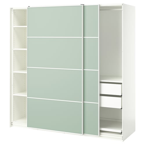 An ikea PAX wardrobe in white with light green sliding doors and multiple shelves inside.