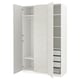 Option: An open white ikea PAX wardrobe with shelves and drawers. The door has a dotted pattern.