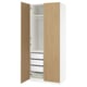 An open ikea PAX wardrobe with light wood doors and white interior featuring shelves and drawers.