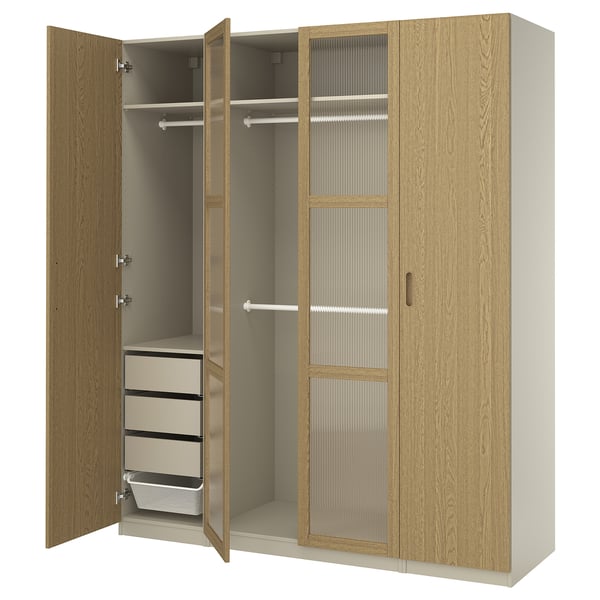 Wooden closet, PAX brand, light brown, rectangular, 3 doors & drawers, open showing storage.