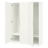 White PAX wardrobe open, showing empty shelves, and soft-close hinges.