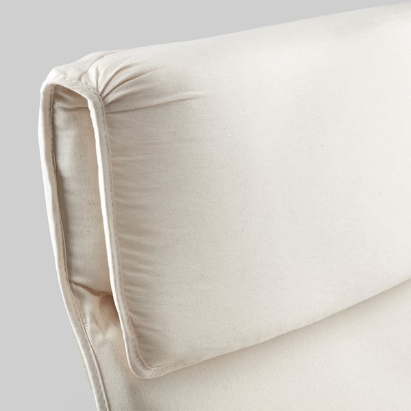 Close-up of a beige armchair cushion, showcasing its plush, textured fabric and sturdy seam stitching, emphasizing comfort and quality.