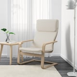 A light wooden armchair with beige cushions offers comfort with back and neck support, suitable for any room.