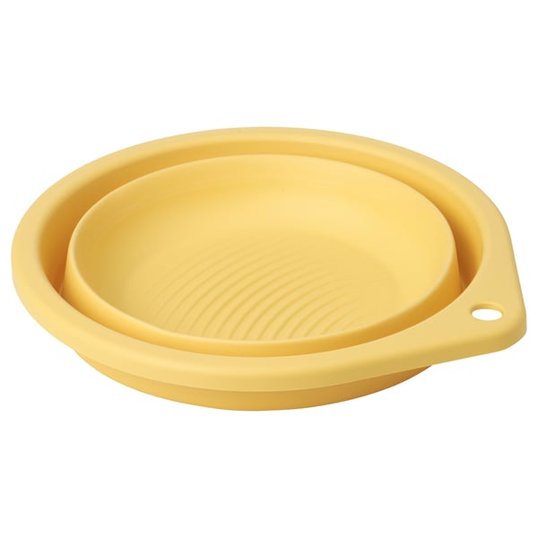PEPPRIG yellow plastic foldable basin, round with grooved bottom, compact design.
