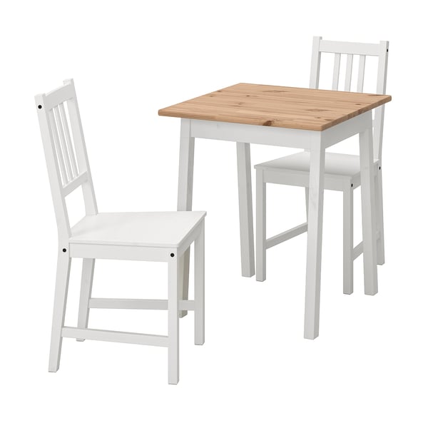 Small white wooden dining set with a rectangular table and matching chairs for compact spaces. Simple, clean design with natural wood accents.