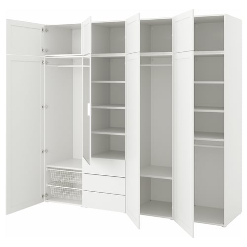 White PLATSA storage system with multiple open shelves and a section with hanging rail and baskets.