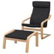 A black POÄNG armchair with a matching footstool, both made from oak and upholstered in soft fabric, designed for comfort and modern style.