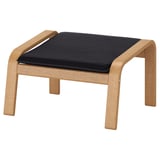 A POÄNG footstool with a black cushioned seat and oak wooden frame. It a simple, arched design for comfortable footrest.