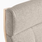 It shows a high-quality, upholstered headrest of the POÄNG armchair, featuring a textured fabric in neutral tones.