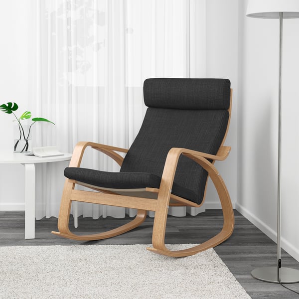 Modern rocking chair with black cushion and wooden frame.