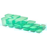 Bright green plastic food containers, various sizes, stacked neatly in two rows. Transparent, rectangular shapes with locking lids.