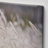 Close-up of a RAMHÄLL wall art corner, showing detailed stitching and fabric texture.