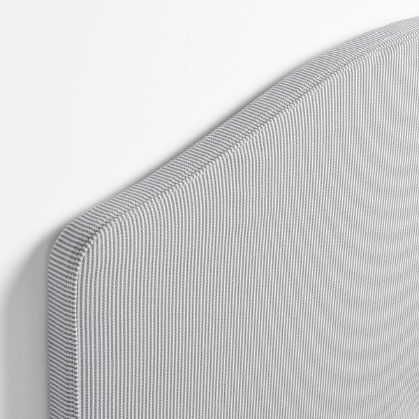 Soft, striped bed headboard, timeless and comfortable, with clean, precise stitching.