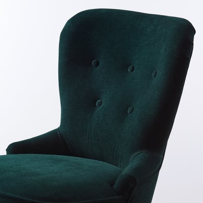 Dark green upholstered chair with tufted back and armrest detail; classic design.