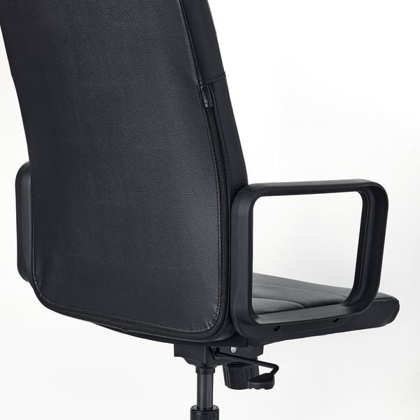 Black office chair with adjustable armrests and tilt, showcasing durable fabric and sturdy design.