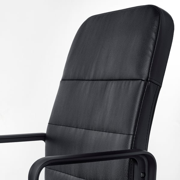 Ergonomic black office chair with cushioned seat and back, sturdy armrests, against plain white background.