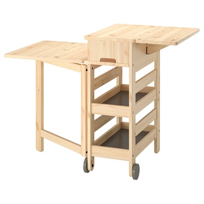 RESARÖ: mobile, light wooden drop-leaf table, perfect for dining or workspace, with shelves for storage. Natural wood finish.