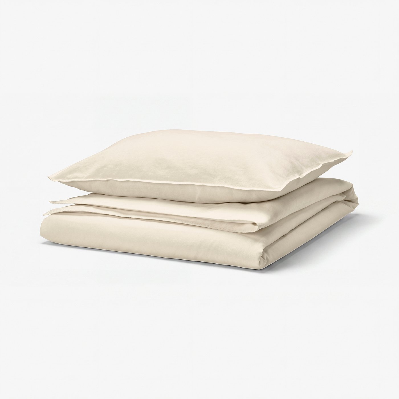 Beige RUNDHAGTORN duvet set, folded. Made of linen and cotton, wrinkle-chic, with smooth, soft fabric.