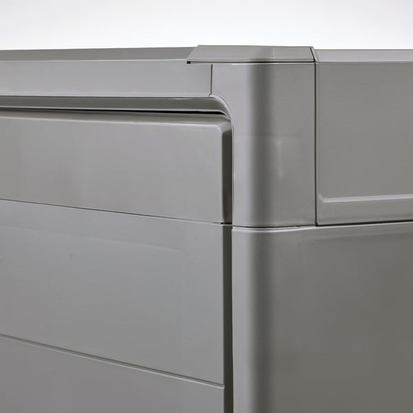 Silver storage cabinet, sleek design, smooth finish, durable plastic.