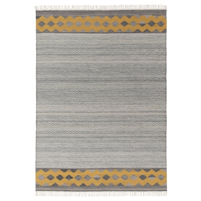 Grey and yellow woven wool rug with fringe, diamond patterns.