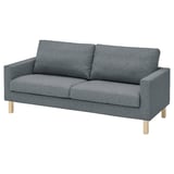 Modern grey couch with light wood legs, sleek and boxy design.