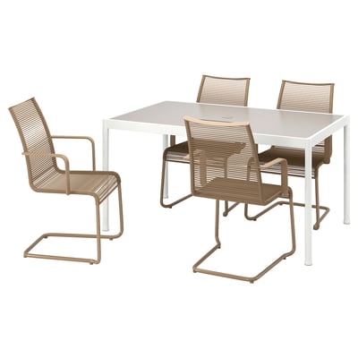 White square outdoor table with four light brown chairs.