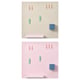 Displays two SKÅDIS pegboards in beige and pink colors, featuring organized pegs and accessories.