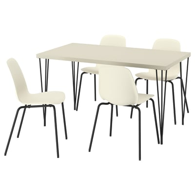 SKÅLSTA dining set: light table & four white chairs, metal legs.