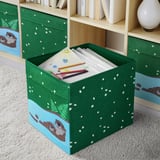 Green boxes with otter designs for kids art supplies. Fits kallax shelving.