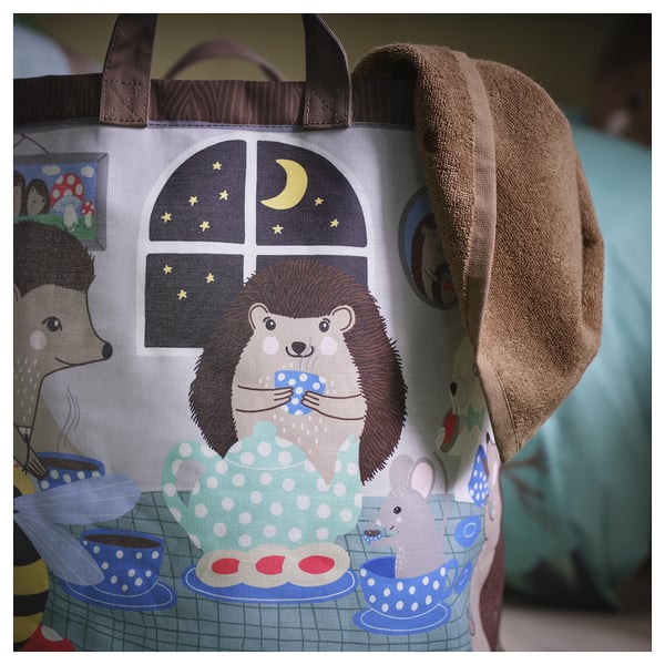 Adorable hedgehog family tea party scene on storage bag. Plush handle, intricate details, vibrant colors.