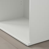 Close-up of clean-lined, white cabinet corner. Showing smooth edges and slight shadow for depth.