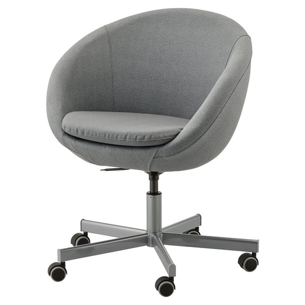 A grey SKRUVSTA office chair. It is round, with a fabric seat and back, and has five rolling castors for mobility.
