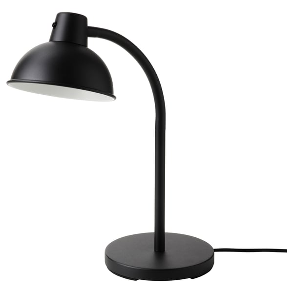 Black SKURUP table lamp with adjustable dome-shaped shade. Modern, minimalist design with round base.
