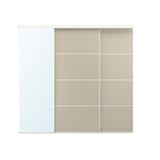 A SKYTTA sliding door in beige and white, featuring a minimalist design with a mix of glass and fiberboard panels.